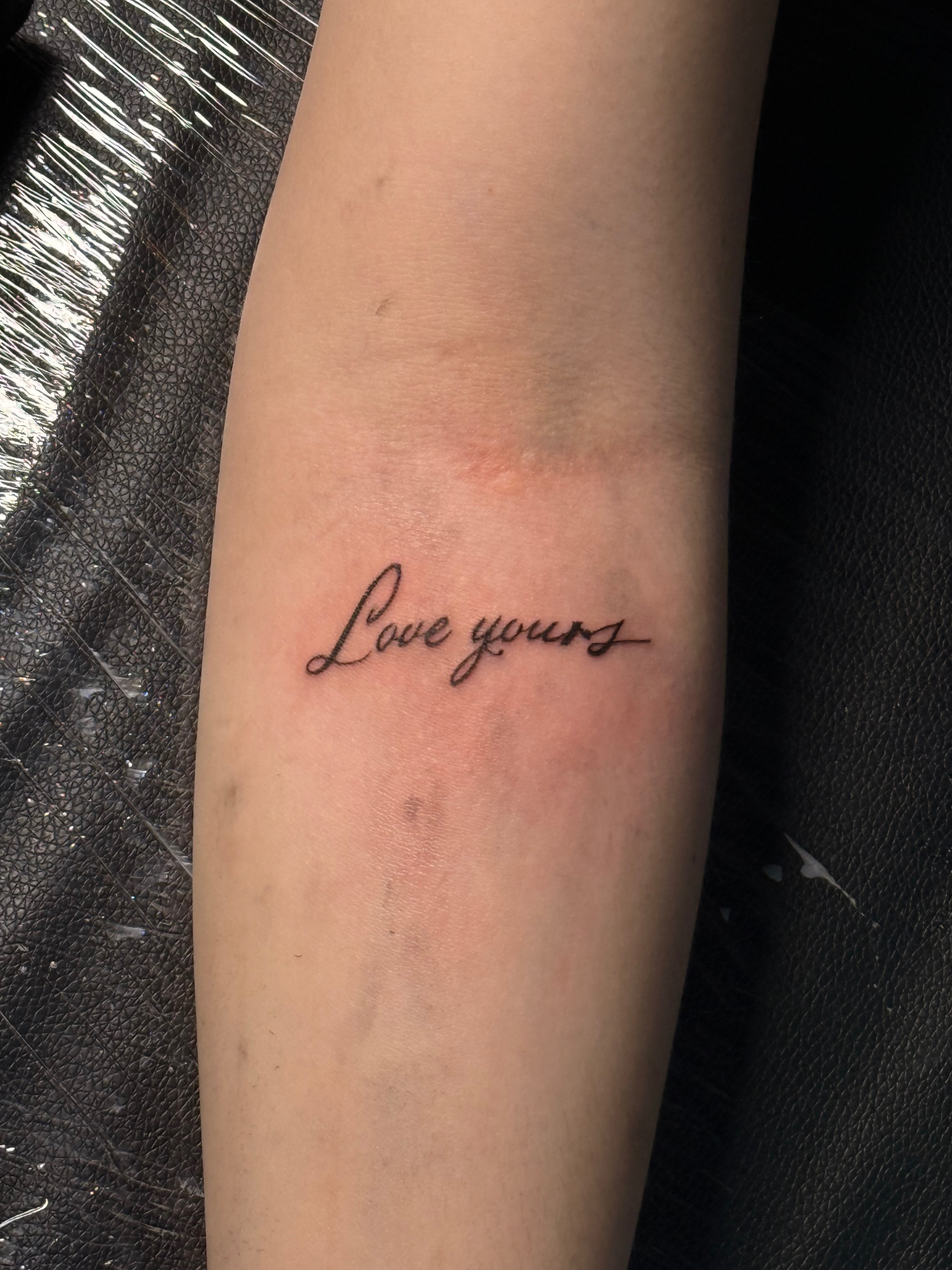 Love yours script forearm tattoo